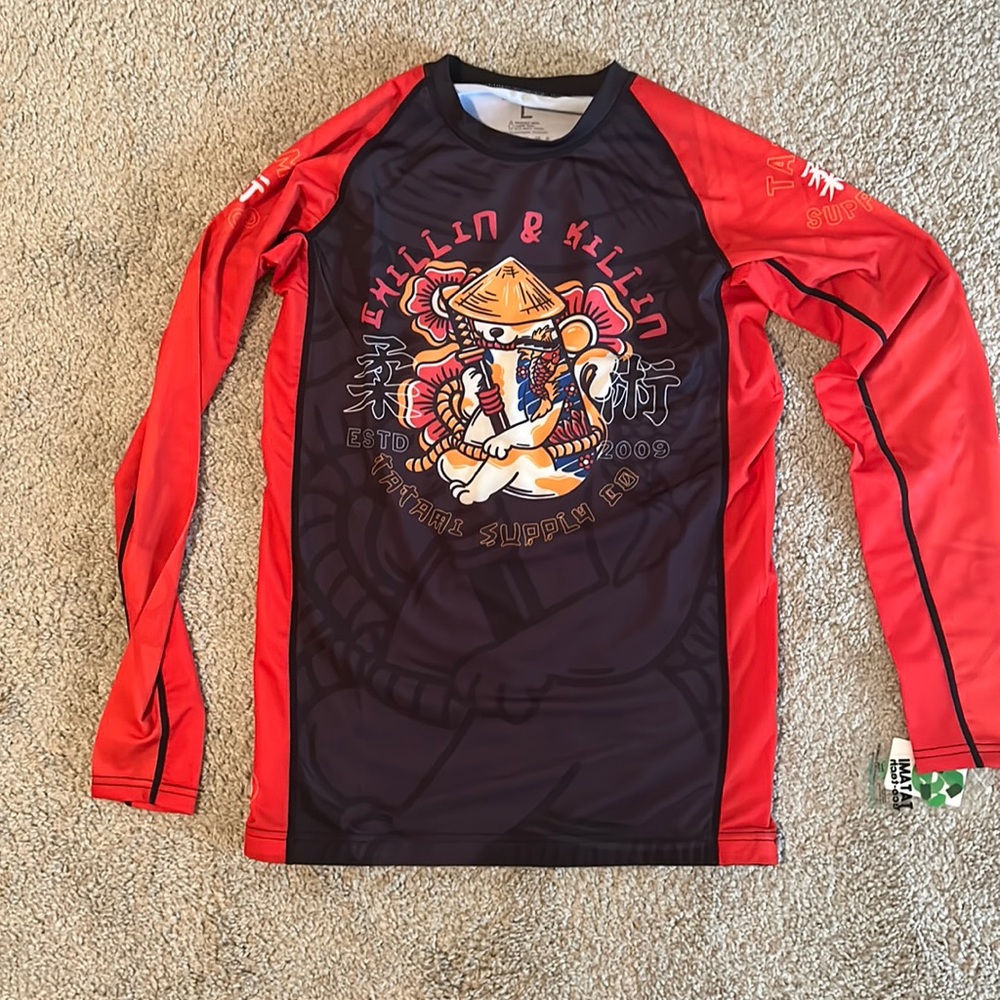 New Tatami Rash Guard Never Worn has tags on it